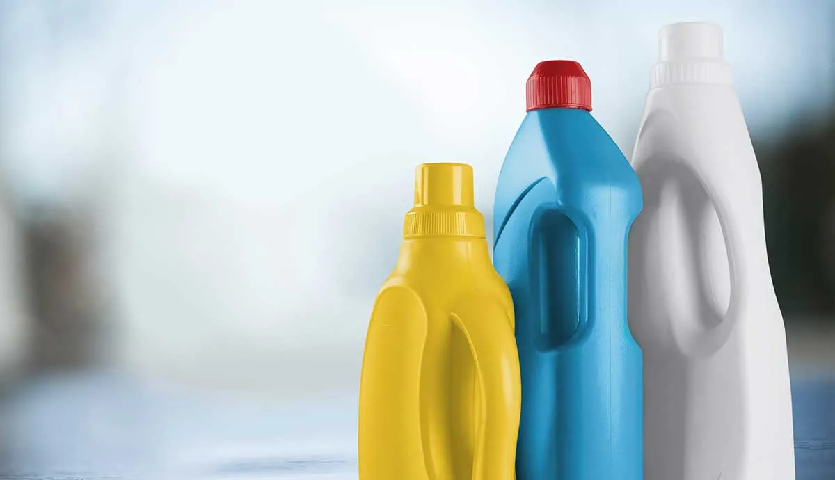 row of three laundry bottles