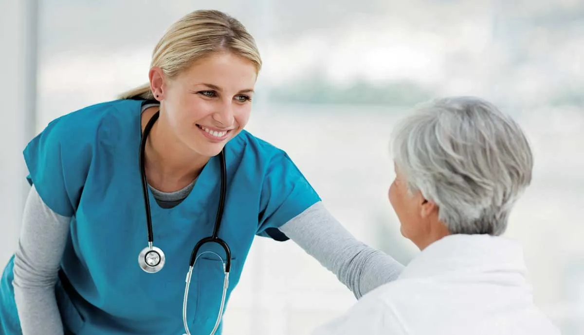 Young Doctor Speaking With an Elderly Patient